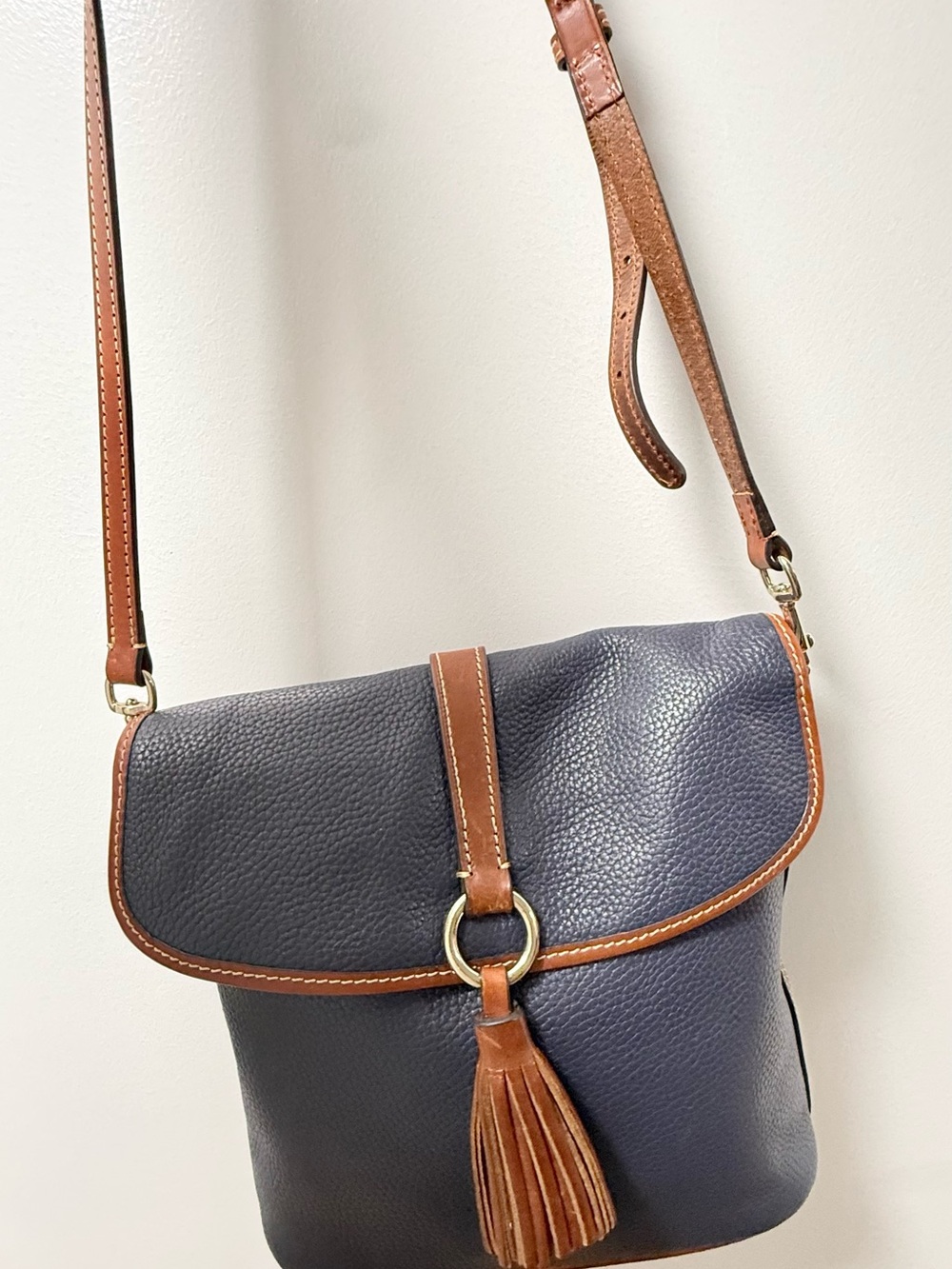 Dooney & Bourke Navy Leather Crossbody with Brown Trim and Tassel